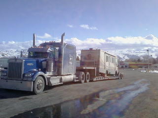 Motorhome hauled on transport trailer